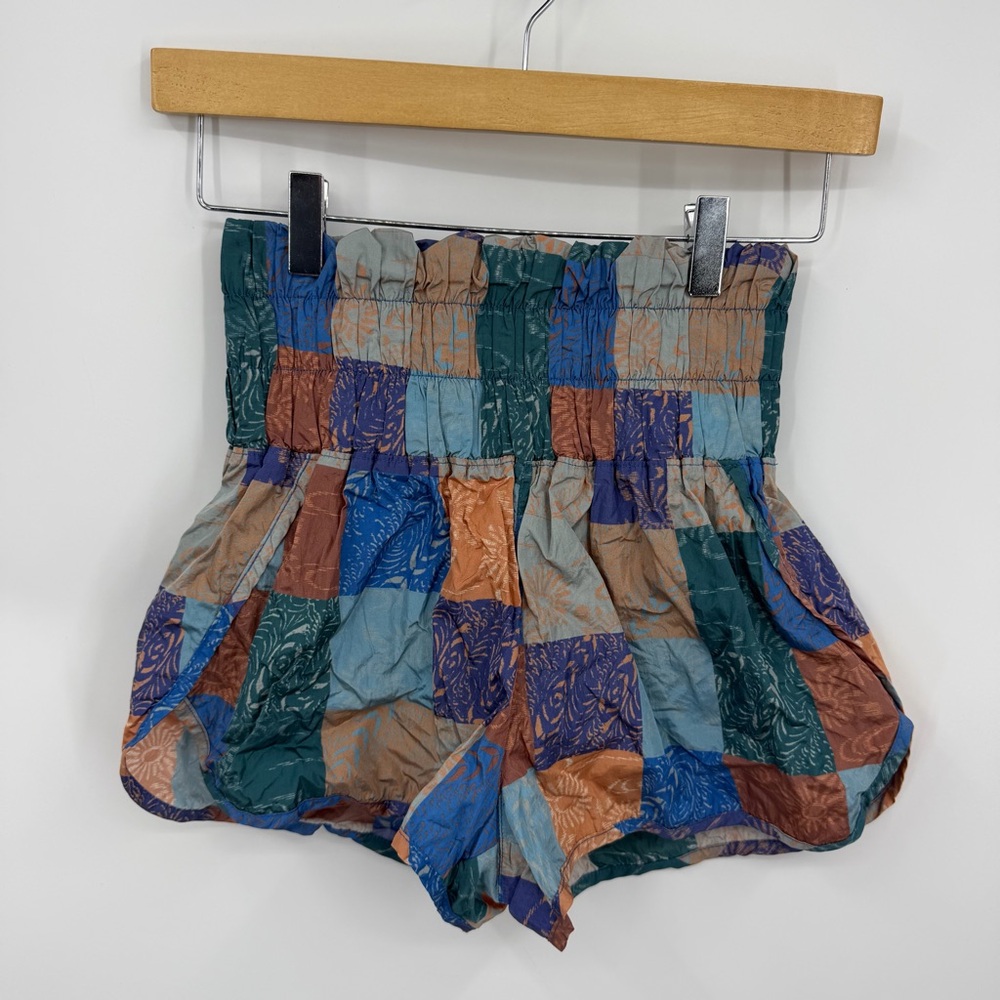 Free People Movement The Way Home shorts in a blue and orange patchwork sz S